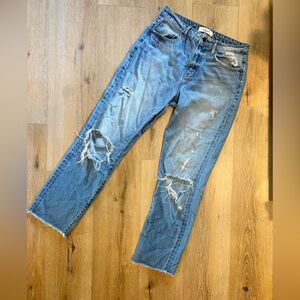 Carly Jean Los Angeles Distressed Blue Straight Leg Jeans. Chrissy Style